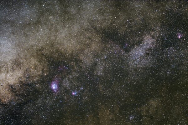 A breathtaking view of the Milky Way showcasing nebulae and countless stars.