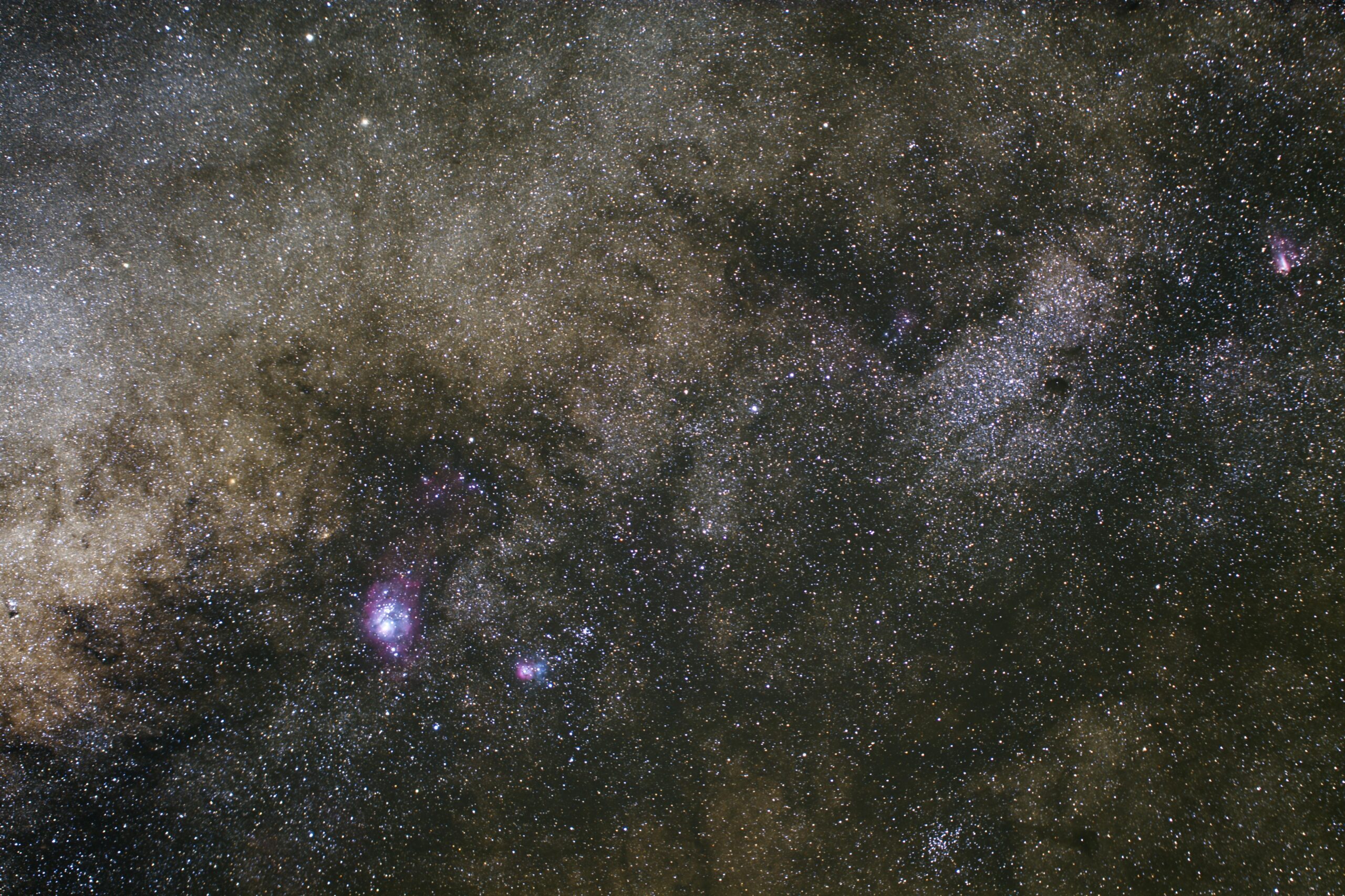 A breathtaking view of the Milky Way showcasing nebulae and countless stars.